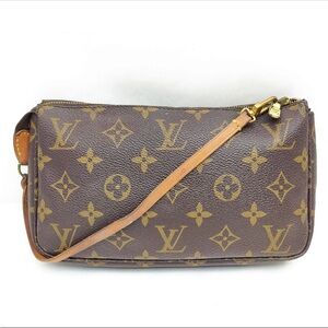 Authentic Louis Vuitton Pochette Accessoires in Monogram Canvas.